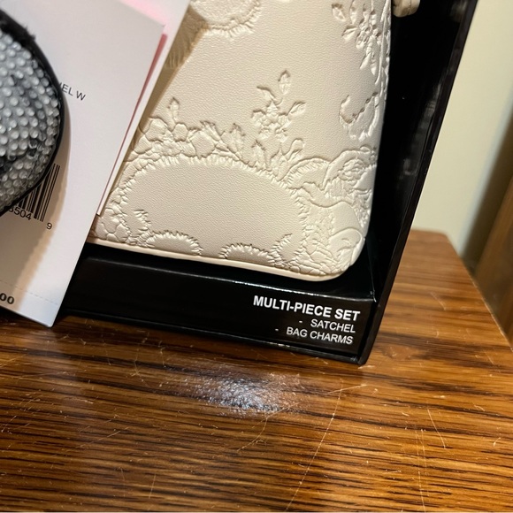 Betsey Johnson Cream Skull Embossed Satchel Crossbody with Skull & Heart Charm - Picture 4 of 8